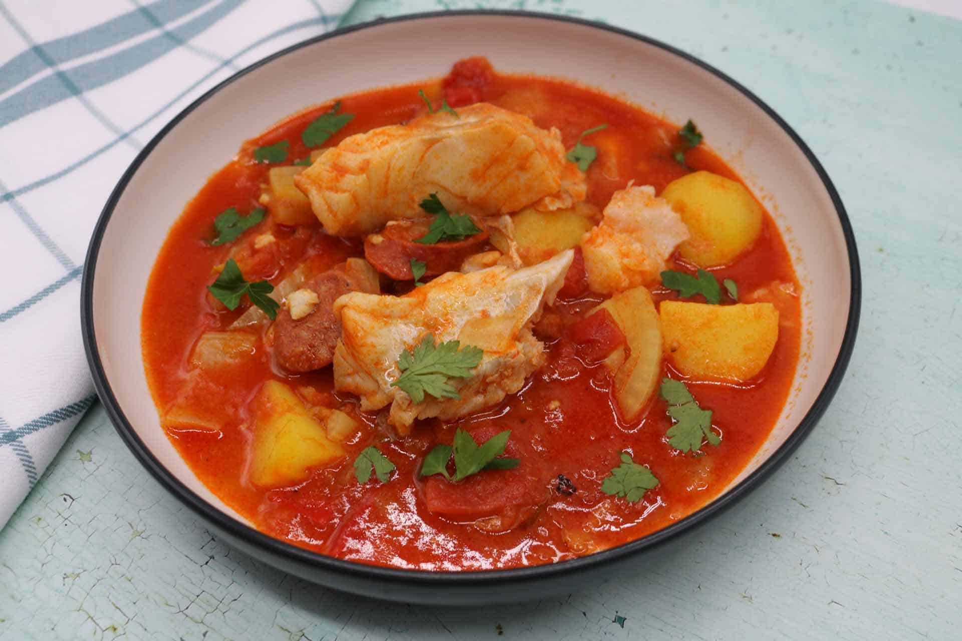 Cod and chorizo stew in large bowl