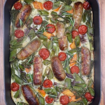 Overhead of toad in the veg patch in large roasting tin