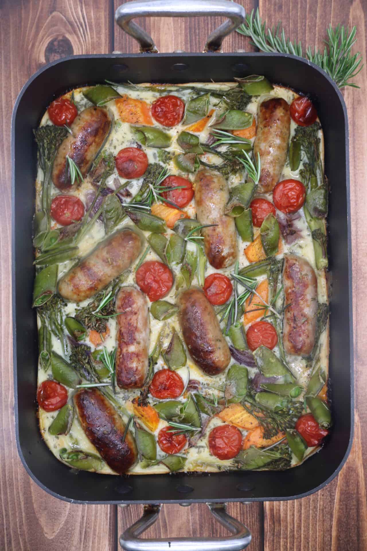 Overhead of toad in the veg patch in large roasting tin