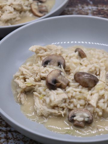 Chicken and mushroom risotto in grey bowls