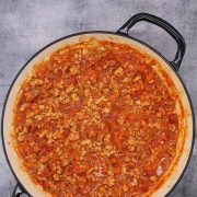 Chicken and chorizo bolognese in large round casserole