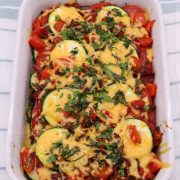 Courgette and tomato gratin in rectangle oven dish