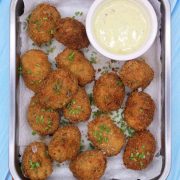 Smoked Haddock Chorizo and Cheddar Croquettes in oven tray with chives