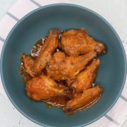 Easy air fryer piri piri chicken wings in green bowl