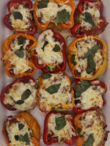 Bolognese stuffed peppers in large rectangle oven dish