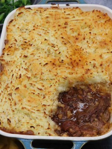 Cheesy beef bourguignon pie in rectangle serving dish
