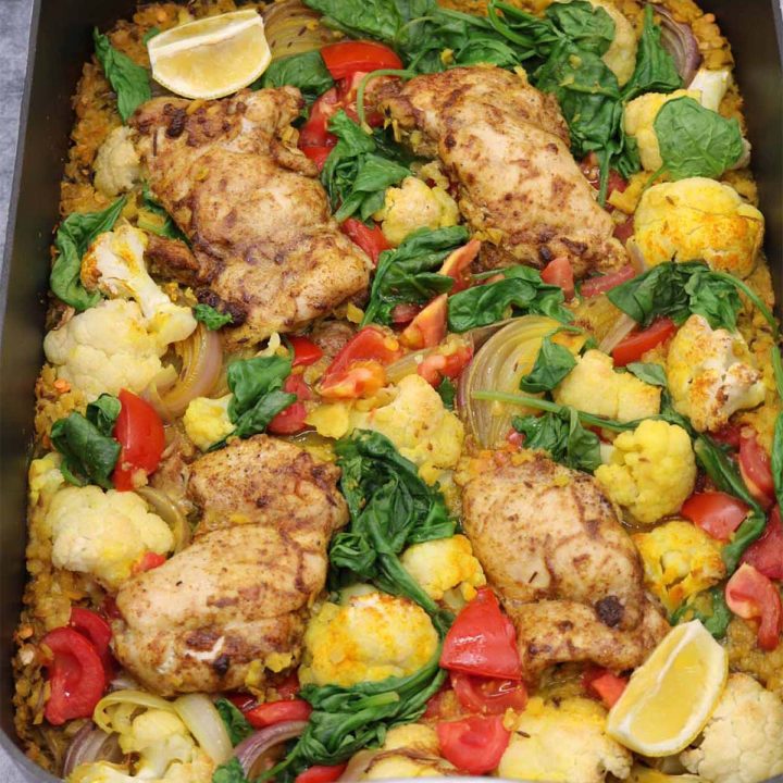 Curried chicken baked dhal in large roasting tin