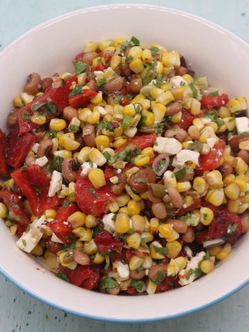Grilled sweetcorn salad with feta in bowl