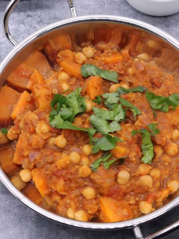 Lentil and sweet potato curry in balti dish