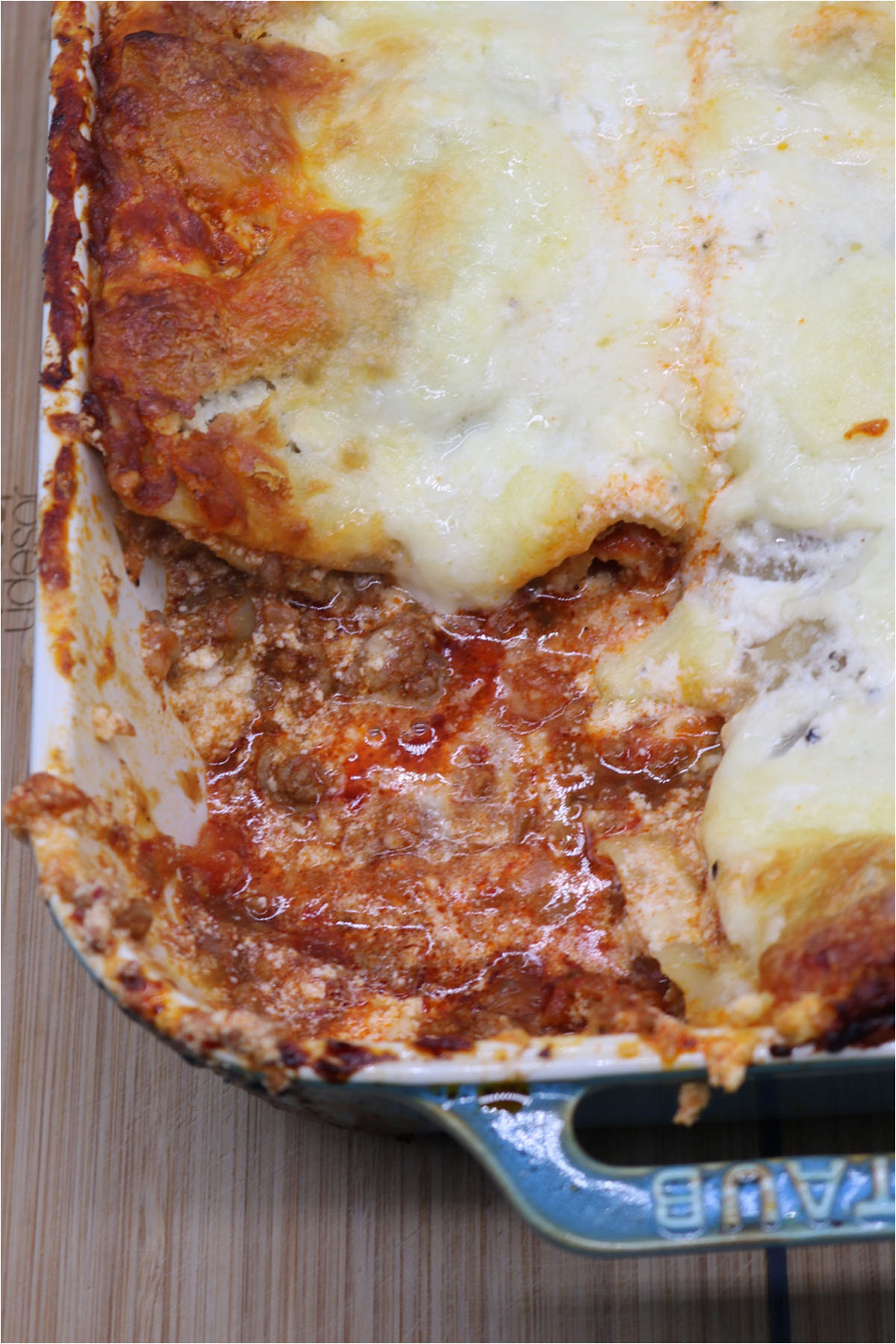 Close up of 'Nduja lasagne in rectangle oven dish