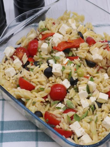 Orzo salad with Feta in clear square bowl