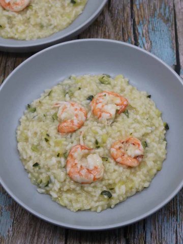 prawn and courgette risotto in grey bowls