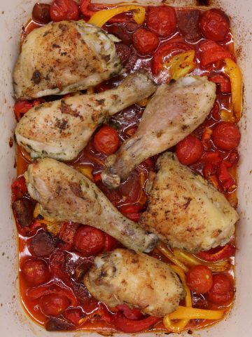 Spanish chicken tray bake in rectangle oven dish