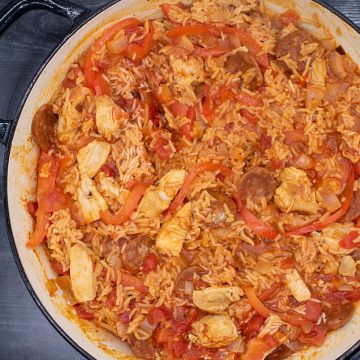Chicken and chorizo jambalaya in a round casserole dish