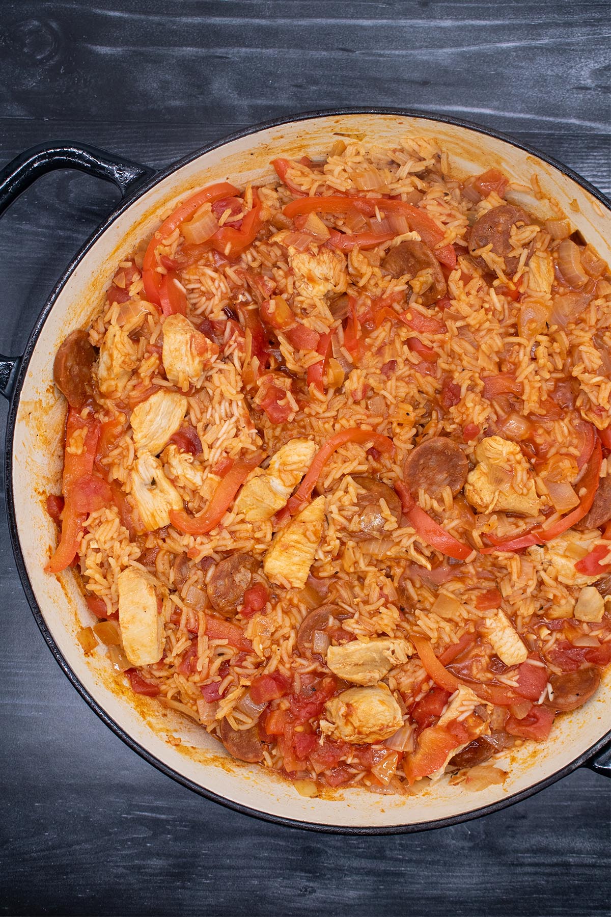Chicken and chorizo jambalaya in a round casserole dish